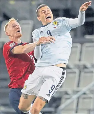  ??  ?? Lyndon Dykes in action against the Czech Republic last Monday night