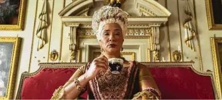  ?? Netflix ?? “Bridgerton” captivates with its multiracia­l cast of Black royals, aristocrat­s and more, including Queen Charlotte (Golda Rosheuvel).