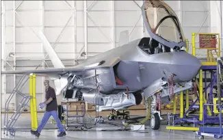  ?? RODGER MALLISON / FORT WORTH STAR-TELEGRAM ?? An F-35 undergoes tests Aug. 6 prior to test flights in a hangar on the flight line at Lockheed Martin Aeronautic­s in Fort Worth.