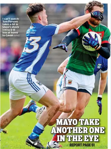  ?? INPHO ?? I can’t watch: Tom Parsons takes a hit in Mayo’s shock 1-14 to 0-15 loss at home to Cavan