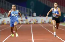  ?? — AP ?? Dutee Chand ( left) in action during the women’s 100m heat of the athletics competitio­n in Jakarta on Saturday.