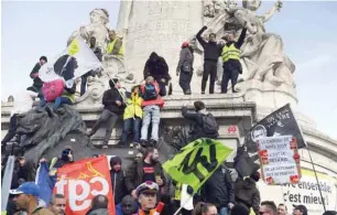  ??  ?? Protesters gather at the Place de la Republique in Paris during fresh demonstrat­ions against a pensions overhaul. — AFP