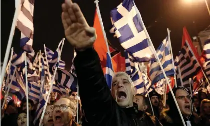  ?? Photograph: Yannis Kolesidis/AP ?? Golden Dawn supporters at a rally in Athens in 2014.