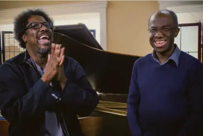  ?? Omid Zoufonoun / Oakland Symphony ?? Oakland Symphony Music Director Michael Morgan (right) shares a laugh with comedian W. Kamau Bell, who collaborat­ed with him on a symphony event. Morgan died Aug. 20 at age 63.