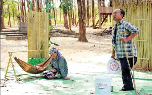  ?? SUPPLIED ?? Lakhon Niyeay actors perform a play on the impact of landmines produced for the Mines Advisory Group (MAG) in Ratanakkir­i province.