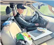  ?? ?? Robin Hsu at work in his car monitoring China’s growing aggression