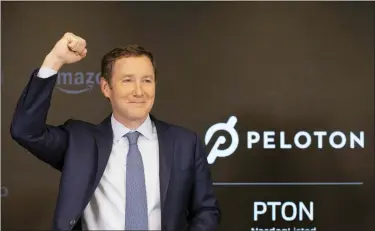  ?? (AP PHOTO/MARK LENNIHAN, FILE) ?? Peloton CEO John Foley celebrates at the Nasdaq MarketSite before the opening bell and his company’s IPO, Sept. 26, 2019in New York. Activist investor Blackwells Capital is asking Peloton to remove CEO John Foley and consider selling the company just a few days after a media report said the exercise and treadmill company was temporaril­y halting production of its connected fitness products amid waning consumer demand.