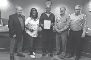  ?? PHOTO BY SHAUNA MCNAMARA ?? Marion County Commission­ers proclaimed February to be Black History Month. The Black Heritage Council is pictured accepting the proclamati­on in 2020.