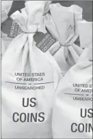  ??  ?? UNSEARCHED: Pictured above are the unsearched Vault Bags loaded with over 2 pounds of U.S. Gov’t issued coins some dating back to the 1800’s being handed over to Pennsylvan­ia residents by Federated Mint.