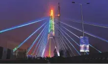  ?? AFP ?? The ‘Signature Bridge’ features pylons structured in a way that symbolises the Indian hand greeting of ‘namaste’.