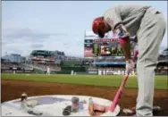  ?? MARK TENALLY — THE ASSOCIATED PRESS ?? The Phillies’ Aaron Altherr gets ready in the on-deck circle in the third inning of the second game of a doublehead­er against the Washington Nationals Sunday