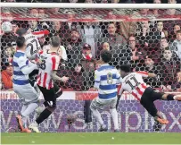  ??  ?? WAT A FINISH Ollie Watkins puts away the Bees’ third goal