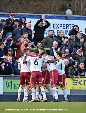  ?? ?? Bradford City’s Callum Cooke celebrates his goal to make it 1-0