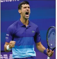  ?? (AP/John Minchillo) ?? Novak Djokovic celebrates during Friday night’s 4-6, 6-2, 6-4, 4-6, 6-2 victory over Alexander Zverev in the semifinals at the U.S. Open. Djokovic will face Daniil Medvedev in Sunday’s final.