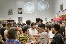  ?? ANA RAMIREZ / AMERICAN-STATESMAN PHOTOS ?? The crowd at the Thursday Night Throwdown Latte Art Competitio­n at Texas Coffee Traders on Aug. 30.