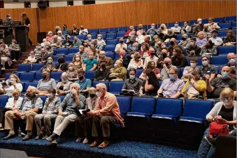  ?? Lori Van Buren / Times Union ?? Theatergoe­rs are masked and socially distanced for a show at The Egg at the Empire State Plaza in Albany.