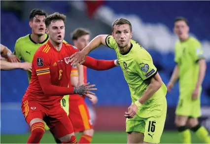  ?? Nick Potts/pa Wire ?? Wales central defender Joe Rodon and Czech Republic’s Tomas Soucek jostle for position last night.