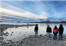  ?? PHOTO: JOHN BISSET/STUFF ?? Low lake levels at places like Lake Tekapo, which help supply hydro-electricit­y to the country, are expected to rise when mountain snow melts.