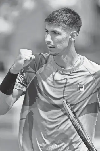  ?? VALERY HACHE/AFP AFP VIA GETTY IMAGES ?? Alexei Popyrin reacts after winning a point against Andrey Rublev during their match at the Monte Carlo ATP Masters on Wednesday.