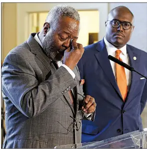  ?? Arkansas Democrat-Gazette/THOMAS METTHE ?? Keith Humphrey chokes up during a news conference Thursday at City Hall after Little Rock Mayor Frank Scott Jr. (right) announced that Humphrey would be the city’s new police chief.