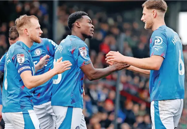  ?? Www.mphotograp­hic.co.uk ?? ●●Isaac Olaofe celebrates after scoring County’s second goal in the 3-1 win at Grimsby Town on Saturday