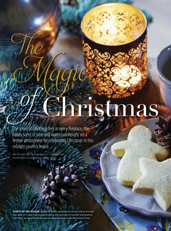  ??  ?? SCENTS OF THE SEASON. A plate of festive shortbread biscuits sits on the hallway table for Lieset’s party guests along with a group of fretwork tea lanterns from Pipii, sprigs of aromatic spruce and pinecones to set the festive mood.