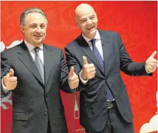  ?? FOTO: DPA ?? Russlands Vize-Premier Witali Mutko, im Archivbild links neben FIFA-Chef Gianni Infantino, wurde lebenslang von Olympia ausgeschlo­ssen. Chef der Fußball-WM WM 2018 ist er weiterhin.