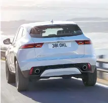  ??  ?? The tail lights are reminiscen­t of the F-Pace. The roofline is rakish and there’s a long rear spoiler to smooth airflow over the rear hatch.
