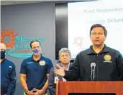  ??  ?? Ron DeSantis addresses the situation at Piney Point at a press conference in Manatee County on Sunday.