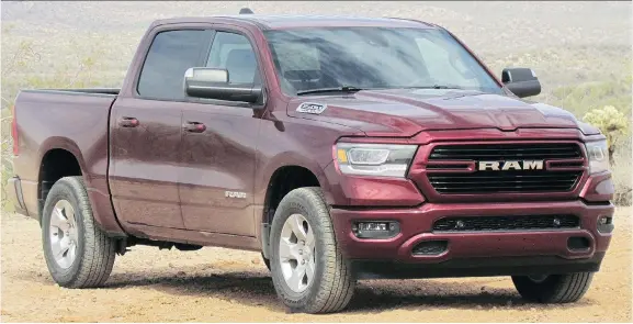  ?? COSTA MOUZOURIS/DRIVING ?? Gone are the trademark crosshairs and ram’s head on the 2019 Ram 1500, which has been redesigned from the ground up, but with two familiar power plants.