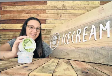  ?? Picture Eugene Coetzee ?? WE ALL SCREAM FOR ICE CREAM: Hannah Mclean at her factory shop in Chicky’s Yard in the Baakens Valley, with some of her Han-Made ice creams