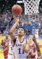  ?? [AP PHOTO] ?? Kansas’ Devon Dotson goes up for a layup during the first half Wednesday against Oklahoma.