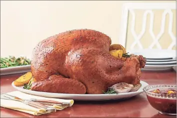  ?? Contribute­d photo ?? A Butterball survey says families nationwide are determined to have a traditiona­l Thanksgivi­ng and although their gettogethe­rs may be smaller, consumers are looking for the same size turkeys as in previous years. Pictured here is the company's herb and citrus butter roasted whole turkey, and the recipe is on their website.