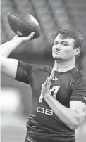  ?? DARRON CUMMINGS/AP ?? Nevada quarterbac­k Carson Strong runs a drill during the NFL combine March 3.