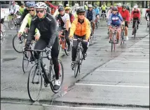  ??  ?? Tracey (orange jacket) getting ready to ride 100 kilometres in the 2015 Big Move Cancer Ride.