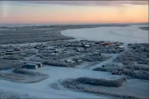  ?? (The New York Times/U.S. Air Force/Alaska National Guard/Emily Farnsworth) ?? An undated aerial image shows the village of Napakiak, Alaska, which is losing 25 to 50 feet each year to erosion.