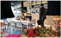  ?? LYNDA M. GONZALEZ / AMERICAN-STATESMAN ?? Customers peruse the new Cookbook Bar &amp; Cafe at the Austin Central Public Library downtown during the eatery’s soft opening Wednesday. The cafe features a seasonal menu that draws from cookbooks available at the library.