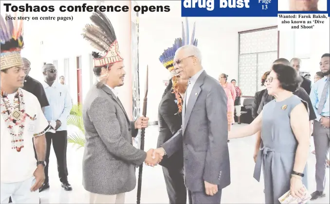  ?? (Ministry of the Presidency photo) ?? President David Granger (second from right) greeting the Vice-Chairman of the National Toshaos Council (NTC), Lennox Shuman at the opening of the NTC confab yesterday at the Arthur Chung Convention Centre, Liliendaal. At right, First Lady Sandra Granger is greeting the Chairman of the NTC, Joel Fredericks (partly hidden)