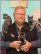  ?? STACI VANDAGRIFF/ THREE RIVERS EDITION ?? Mike Wheeler is shown with some of the cats that are available at the Cabot Animal Shelter.