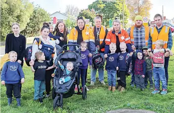  ?? ?? Appealing for a crossing upgrade in Neerim South are (from left) Crystal and son Oliver, Jess with baby Jayden and Kai, Emma and daughter Larni, Carlene with daughter Grace and baby George, Jess, Alana with Noah and Lucas, Matt with Winston and Erthur and Wayne with son Eric.