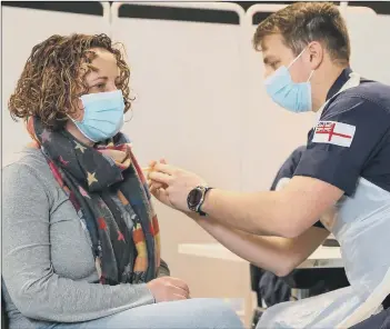  ?? Picture: Royal Navy ?? HELP Royal Navy medics are delivering hundreds of vaccine jabs to people in the South West as part of the national effort to end the pandemic