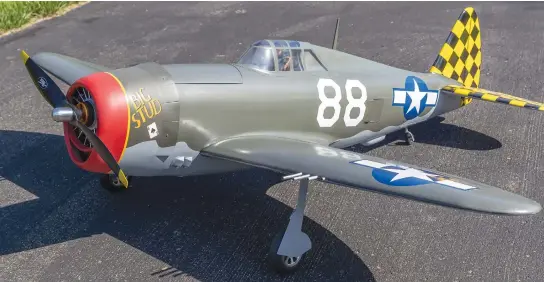  ??  ?? This is the author’s completed Top Flite P-47 Razorback, ready to fly. It weighs 26 1/2 pounds and is powered by an AXi 5345/18 motor, 25x12 Fiala prop, and12S battery.