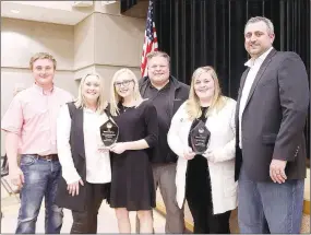  ?? FILE PHOTO ?? Former Prairie Grove City Council member Murph Pair was recognized with a “Life Time Achievemen­t Award” for all his efforts in activities to benefit the community. Chamber President Dale Reed presented the award at the annual Chamber banquet.
What My Eyes Have Seen was named the 2018 Business of the Year and Brea Gragg was named 2018 Citizen of the Year during the Prairie Grove Chamber of Commerce annual banquet in February.