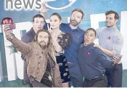  ?? AP ?? Actors Jason Momoa (from left), Ezra Miller, Gal Gadot, Ben Affleck, Ray Fisher and Henry Cavill pose for a selfie to promote ‘Justice League’ in London.