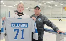  ?? BERND FRANKE THE ST. CATHARINES STANDARD ?? Grade 9 forward Jarrod Callaghan, left, newly arrived from Australia, and Port Colborne High Schools boys hockey head coach Shawn Coers.