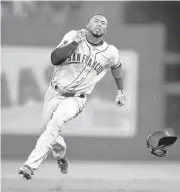  ?? MITCHELL LAYTON/GETTY IMAGES ?? Eduardo Núñez legs out a triple in the fourth inning Saturday, one of his two three-baggers in the Giants’ win.