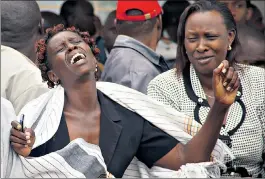  ??  ?? Women grieve in Nairobi after viewing the bodies of relations killed in the university massacre