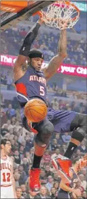  ??  ?? Josh Smith got this dunk against the Bulls on Monday but wasn’t giving the Hawks much beyond that. | CHARLES REX ARBOGAST~AP