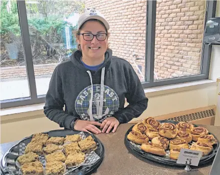  ?? Corey Leblanc ?? Along with training in athletics, Kristina Richard works at the Antigonish CACL workshop café.