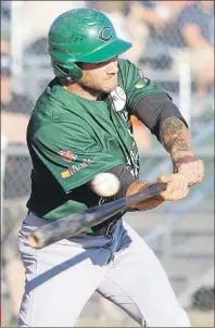  ?? TANYA EVERETT PHOTOGRAPH­Y ?? The Charlottet­own Islanders’ Shawn Albert tips the ball Sunday evening at Kiwanis Field in Moncton during third-inning action against the Moncton Fisher Cats. Moncton won the New Brunswick Senior Baseball League game 2-1 in nine innings.